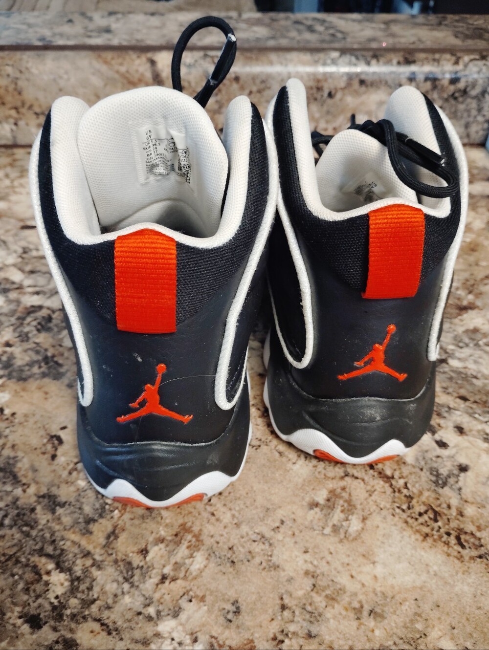Jordan Kids Black and Orange High-Top Sneakers